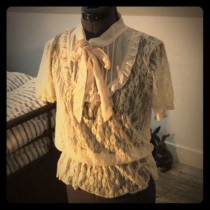 Airy cream lace and chiffon “pussy bow” blouse.
